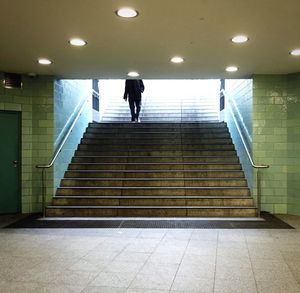 Woman standing in subway
