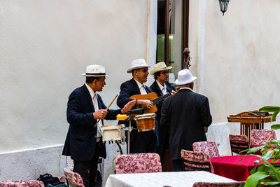 People standing at market stall