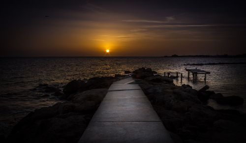 Scenic view of sea at sunset