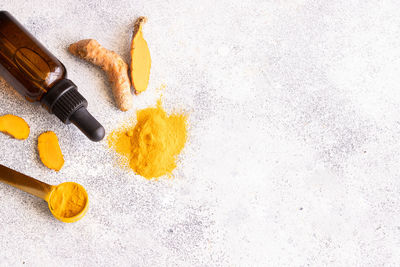 Close-up of fresh orange over white background