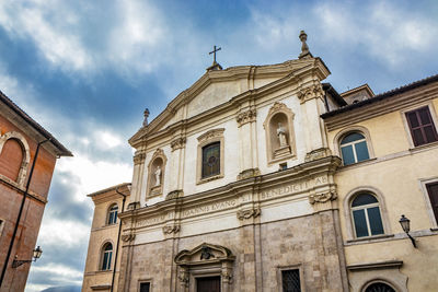 Low angle view of historic building against sky