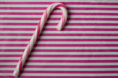 High angle view of pink umbrella on table