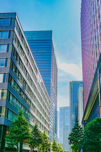 Low angle view of skyscrapers against sky