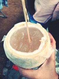 Close-up of woman holding drink