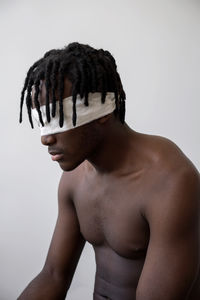 Black man wearing blindfold portrait