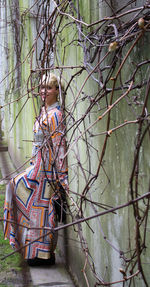 Side view of woman on plants