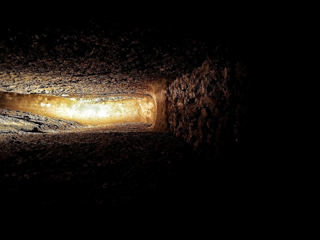 CLOSE-UP OF ILLUMINATED WET CAR