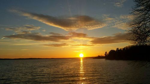 Scenic view of sunset over river