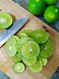 High angle view of green fruits on table