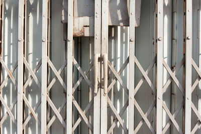 Full frame shot of closed metallic gate