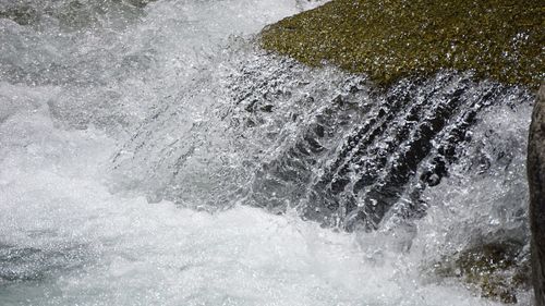 Water splashing on rocks