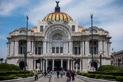 Facade of historical building against sky