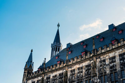 Low angle view of temple against blue sky