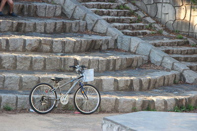 Bicycle parked against wall