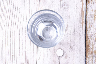 High angle view of glass of water on table