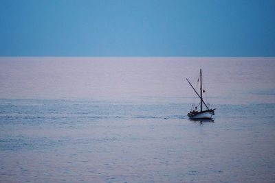 Boat sailing in sea