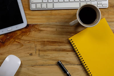 High angle view of coffee cup on table