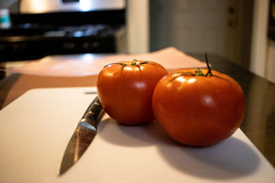 Close-up of oranges on table