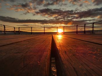 View of bridge over sea during sunset