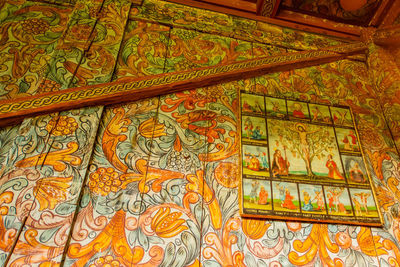 Low angle view of multi colored ceiling in temple