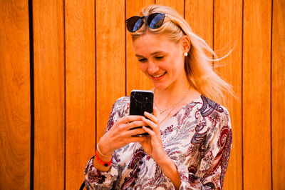 Young woman using mobile phone