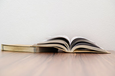 Close-up of open book on table