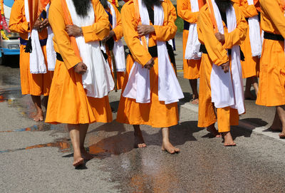 People walking on street in city