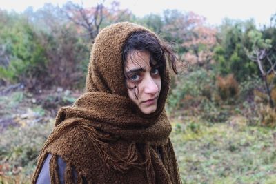 Portrait of beautiful young woman in winter