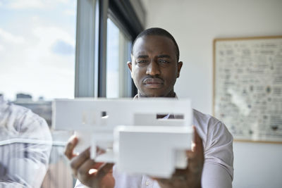 Portrait of man using mobile phone