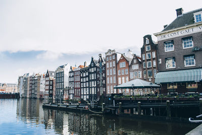 Buildings in city against sky