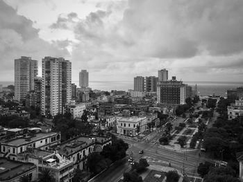 High angle view of buildings in city against sky