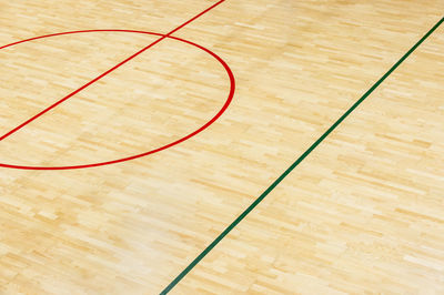 High angle view of basketball hoop on hardwood floor
