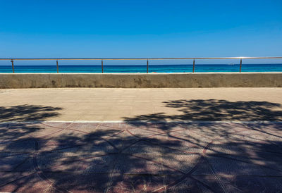 Scenic view of beach against clear sky