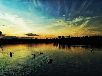 Scenic view of lake at sunset