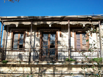 Low angle view of abandoned house