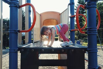 Midsection of a girl on playground