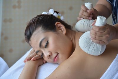 Midsection of woman lying down