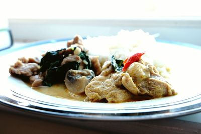 Close-up of food in plate on table