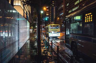 Illuminated city street at night