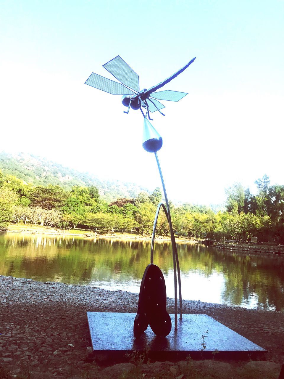 water, lake, day, tree, outdoors, clear sky, nature, real people, alternative energy, childhood, wind power, windmill, wind turbine, sky, beauty in nature, close-up