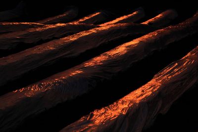 Full frame shot of firewood at night