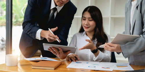 Business colleagues working at office