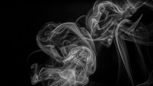 Close-up of fire against black background