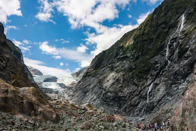 Scenic view of mountains against sky at franz josef glacier new zealand