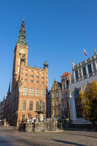 Low angle view of building against blue sky