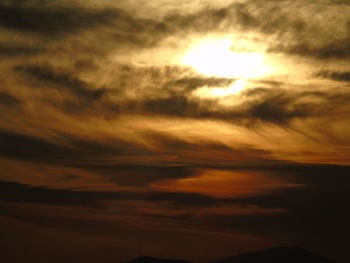 Scenic view of dramatic sky during sunset