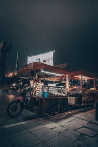 View of illuminated street at night