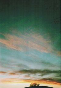 Low angle view of cloudy sky at sunset
