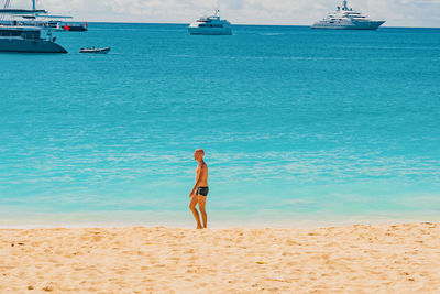 Rear view of man on beach