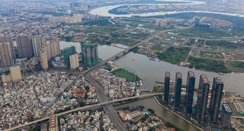 High angle view of river amidst buildings in city